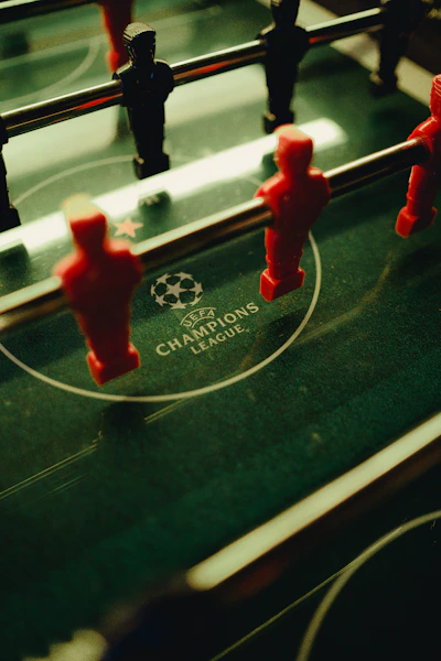 Interactive card displaying football fixtures with dates and team logos in a modern layout.