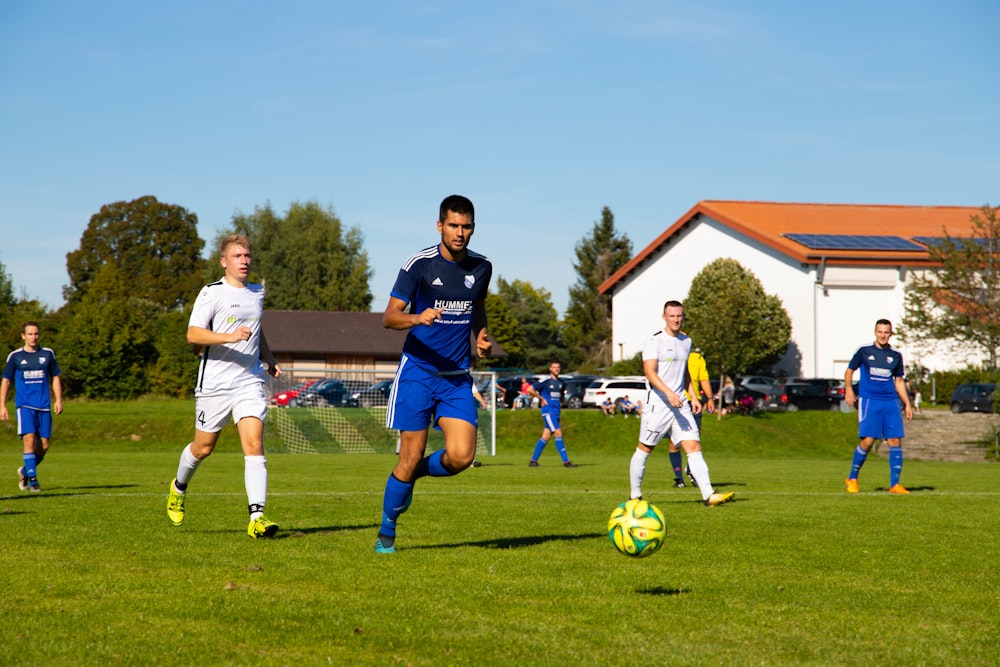 group of men playing soccer