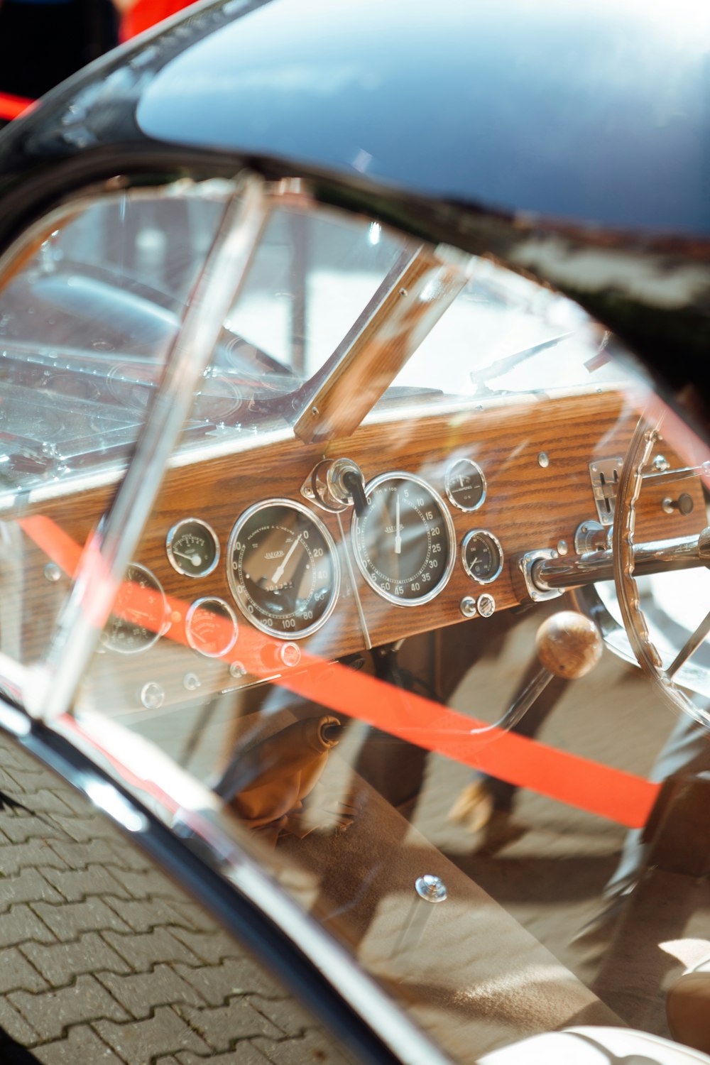 a close up of a car's dashboard and steering wheel