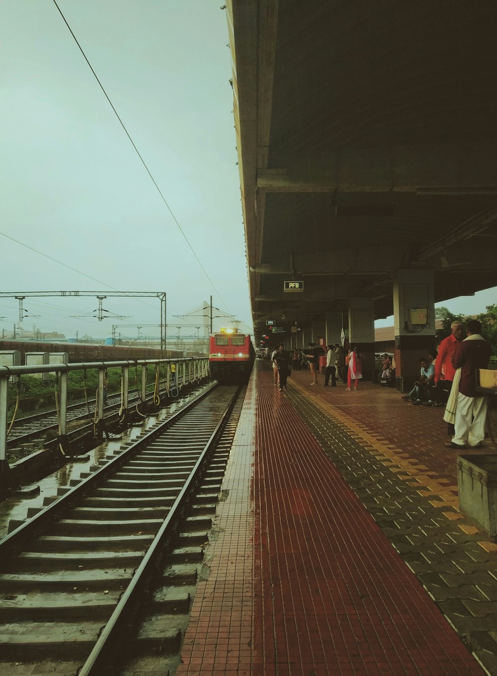 people near train rail\