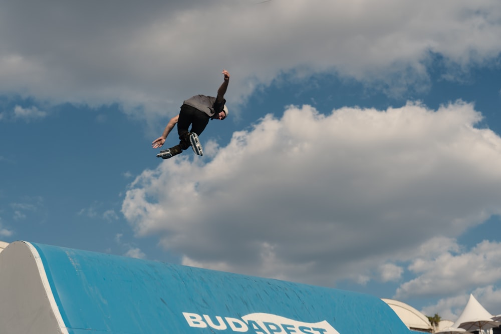 man performing skateboard stunt
