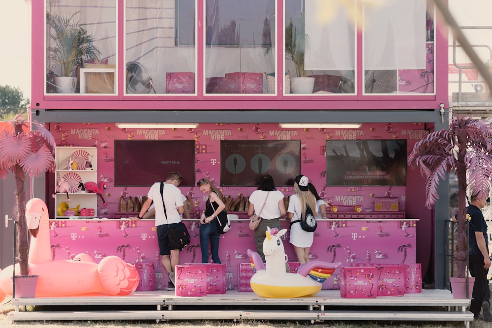 people standing beside store