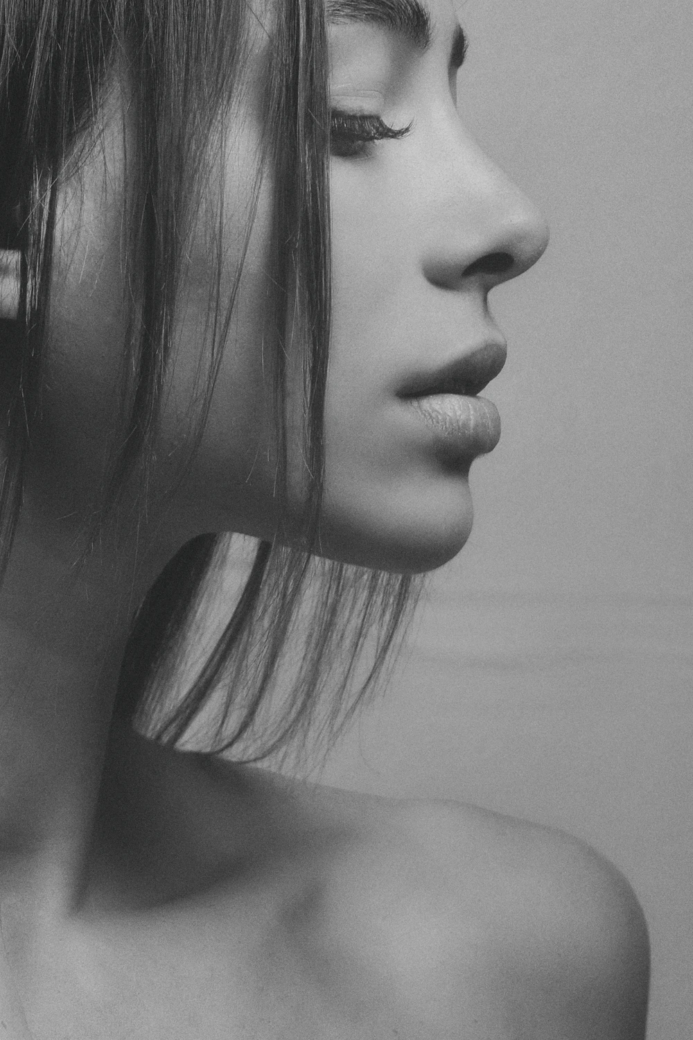 Editorial portrait suggesting refined, natural facial contour