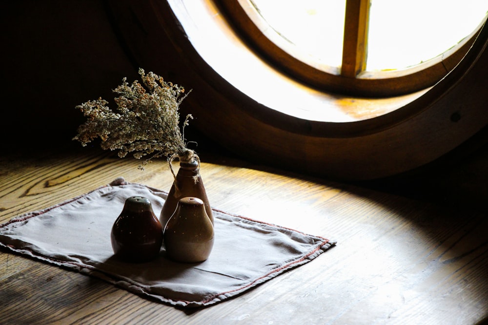 three brown vases