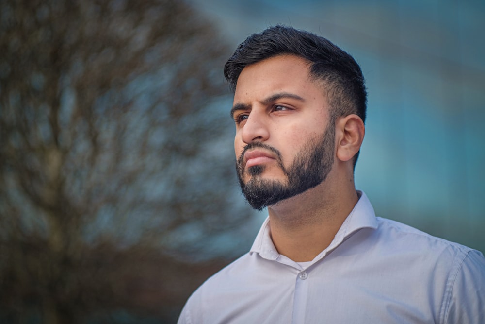 man in white collared top