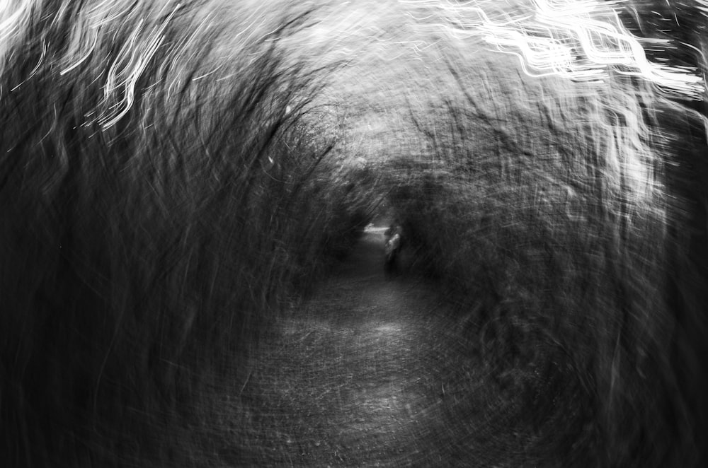 a black and white photo of a tunnel