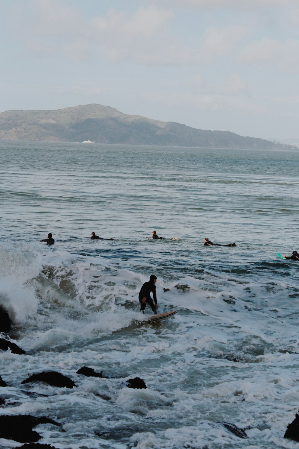 people in ocean during daytime