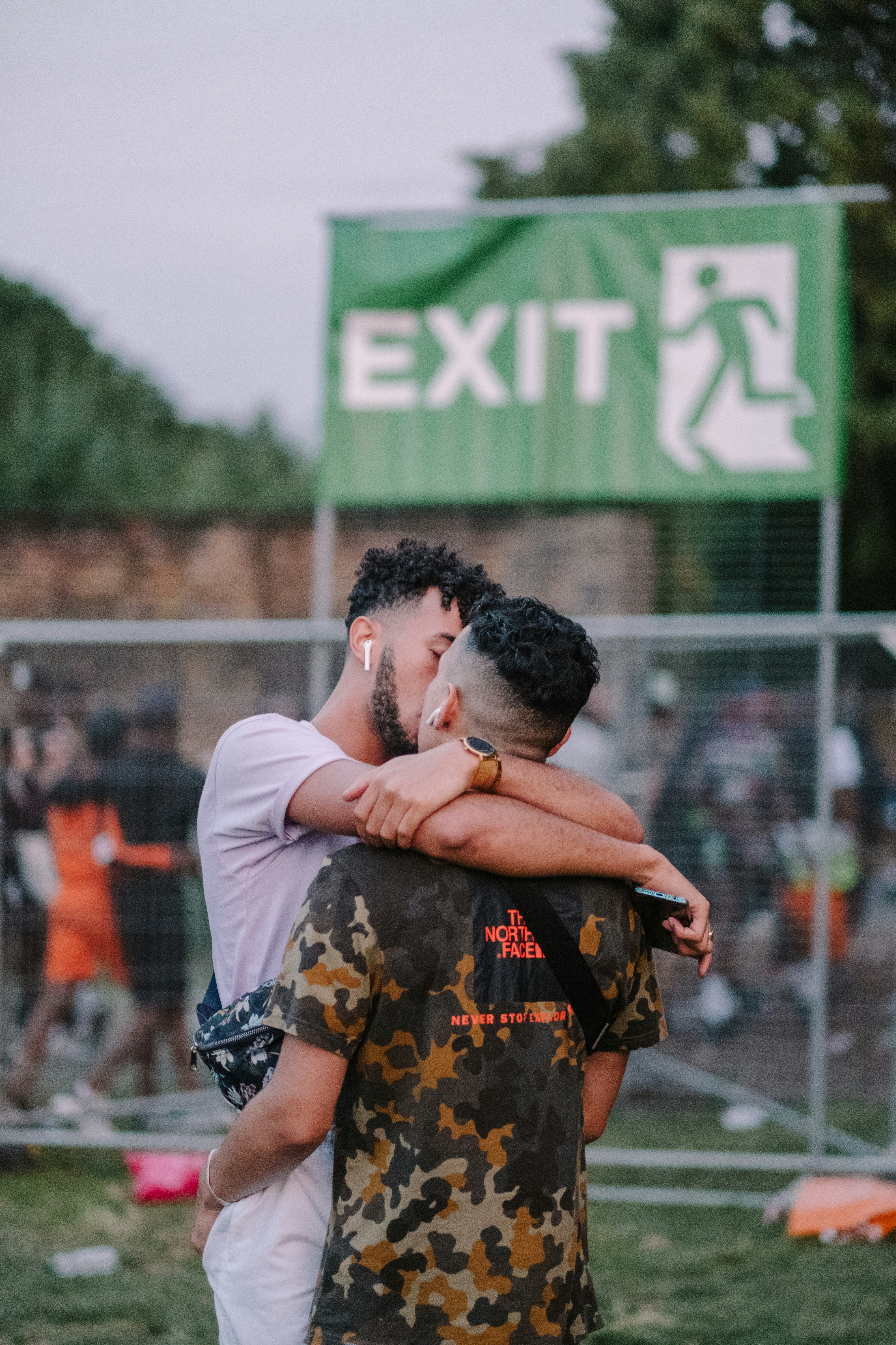 Two people kissing at Black Pride