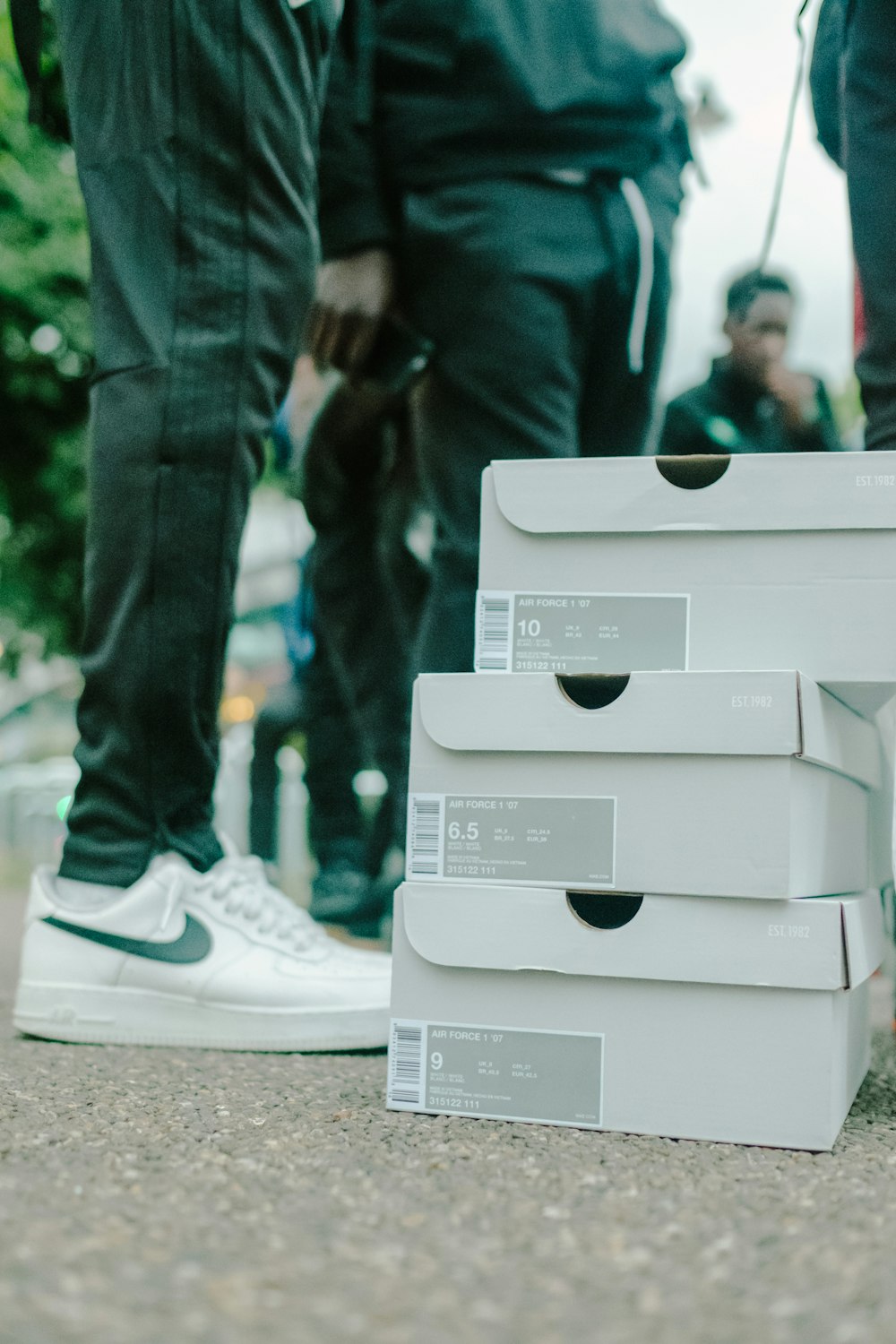 shallow focus photo of gray shoe boxes