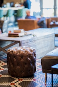 tufted brown leather ottoman