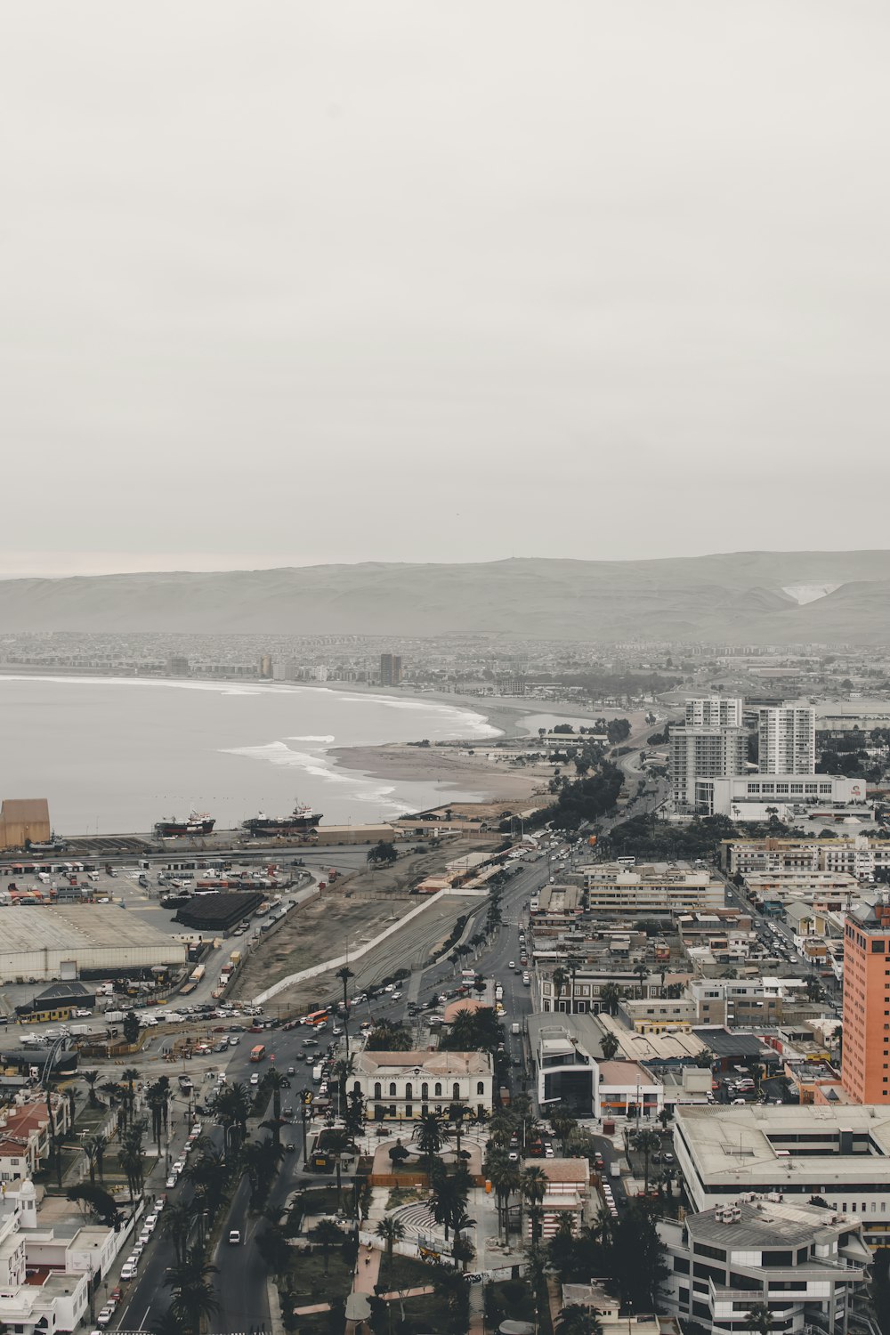 aerial photography of city near body of water during daytime