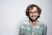 smiling man with glasses and beard portrait