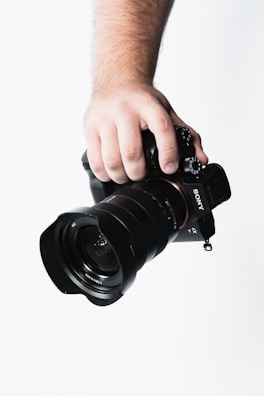 An artistic close-up of a professional photographer at work.