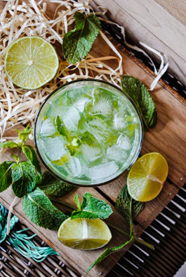 Refreshing buttermilk served in traditional glasses with mint garnish.