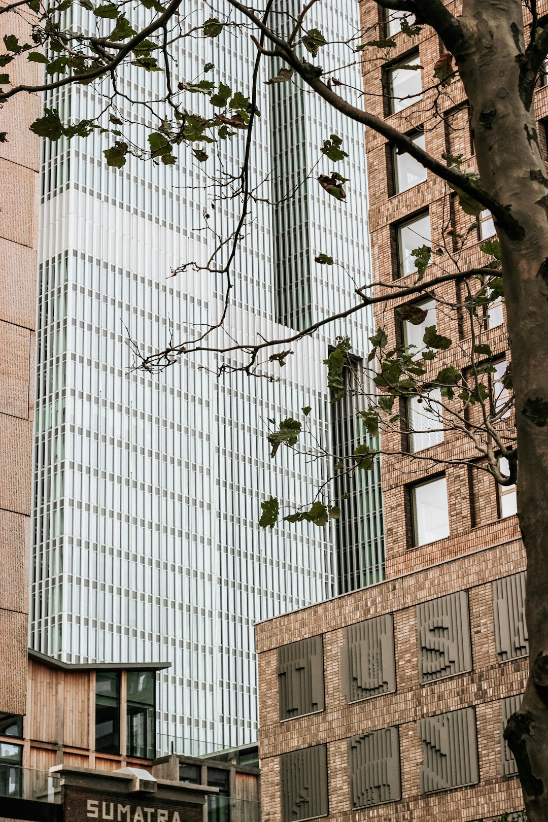 low-angle photography of gray and brown Sumatra building