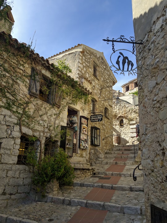 gray concrete stairs at daytime in Èze France