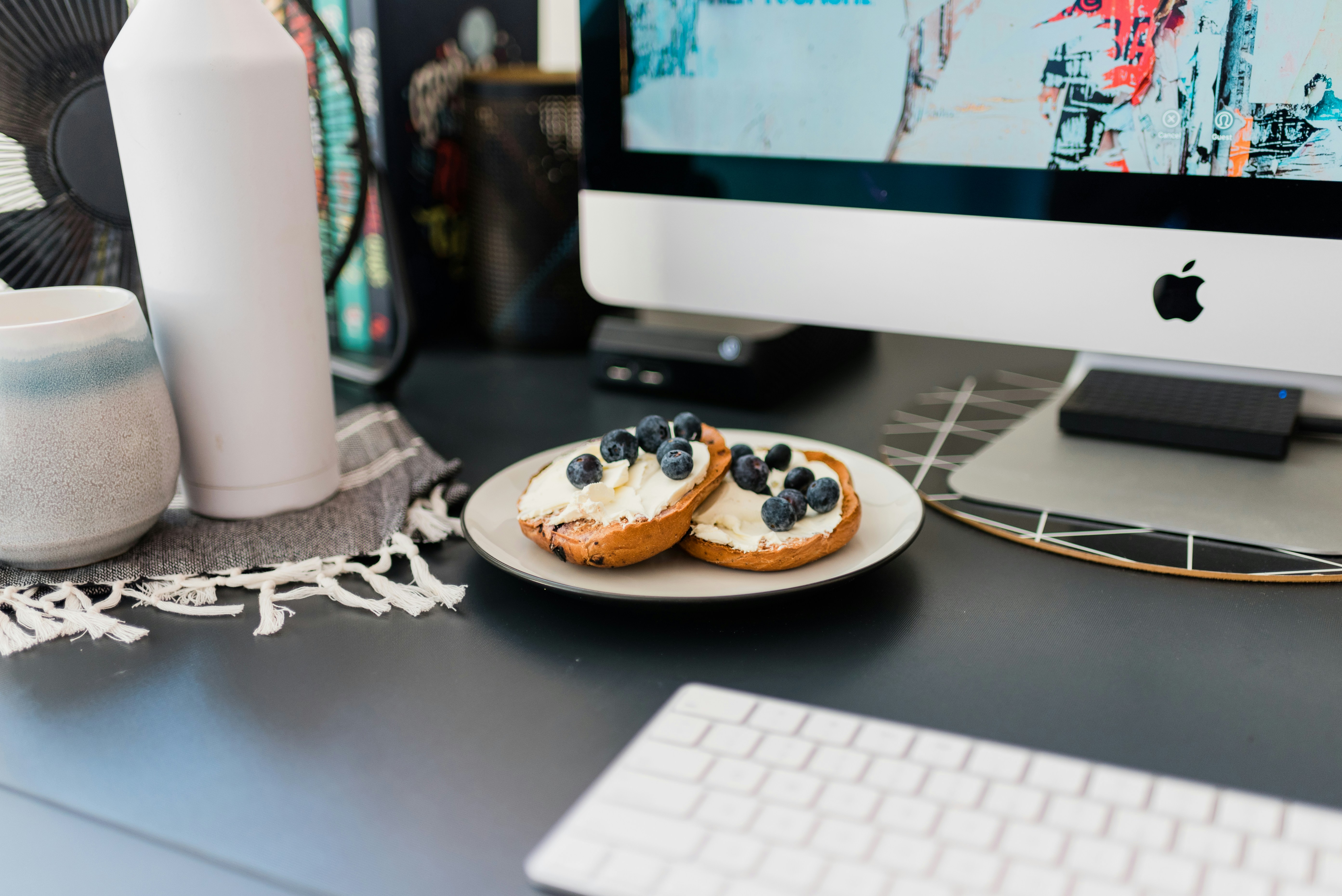 Healthy office snacks—nuts, fruit, and yogurt by Brooke Lark/Unsplash