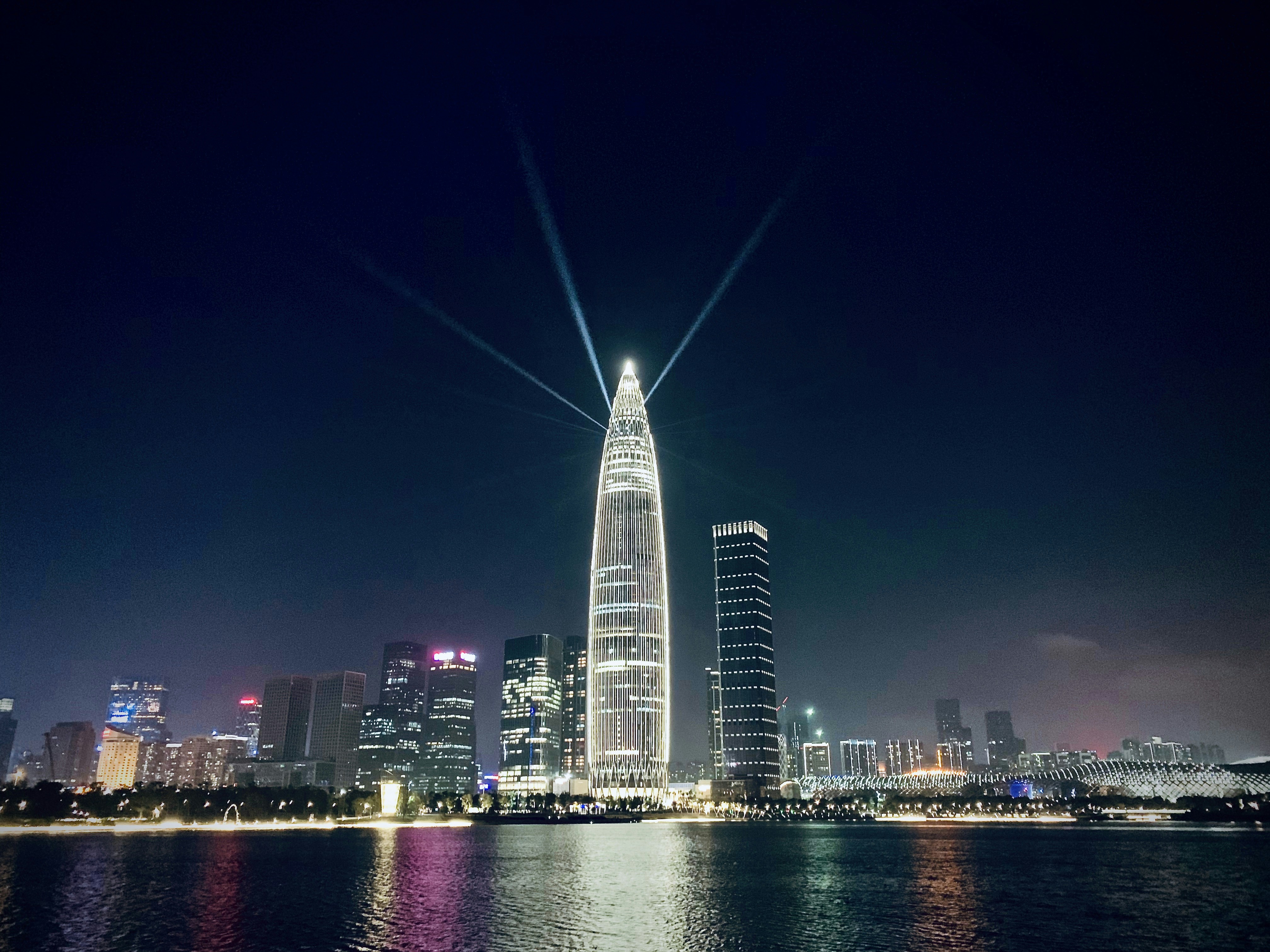 lighted concrete building at night