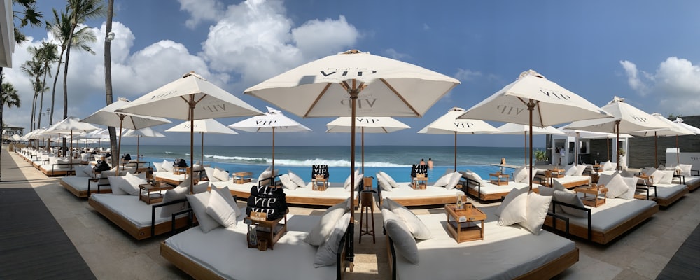 white patio umbrellas at daytime