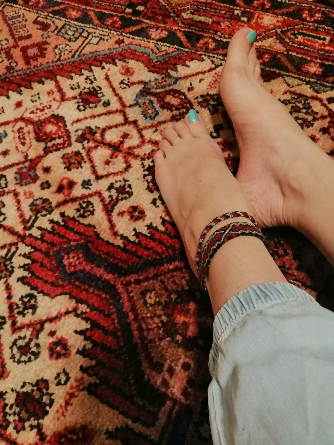 person wearing anklet