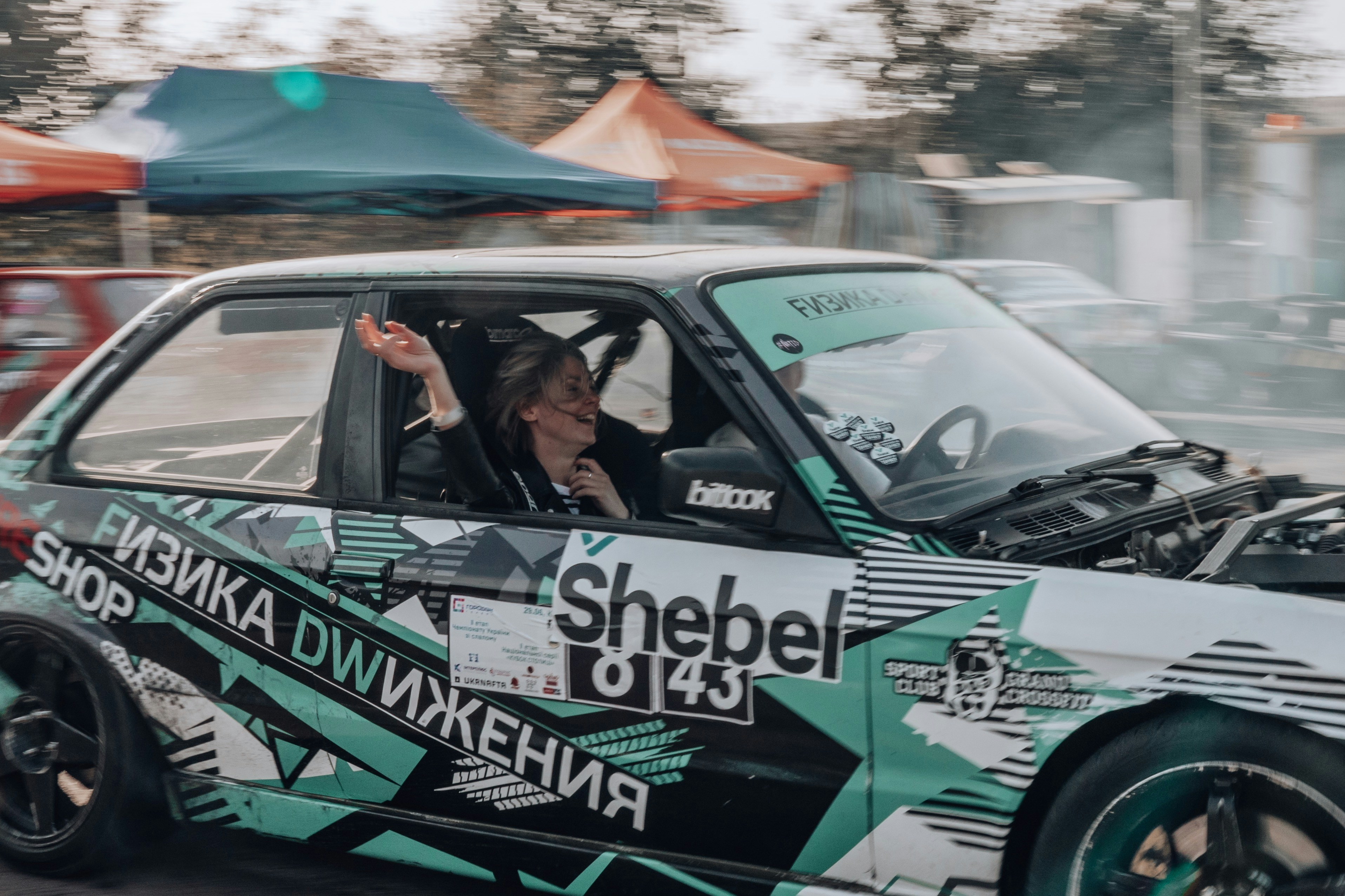 man and woman sitting inside vehicle