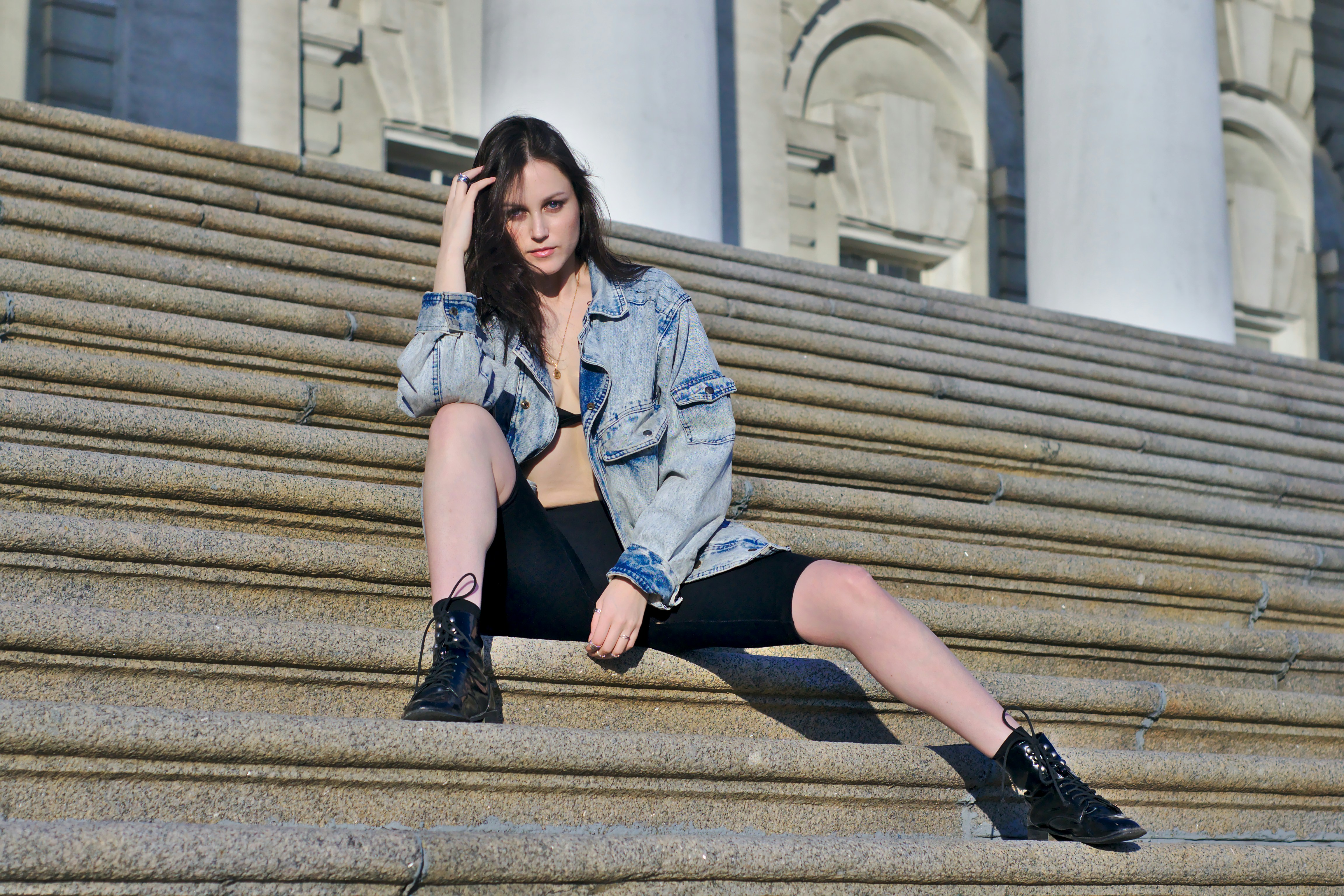 woman sitting on stair