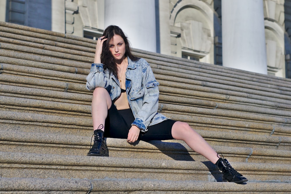 woman sitting on stair