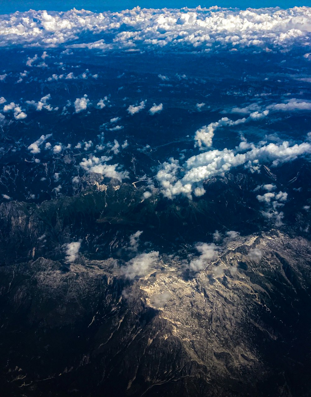 a view of a mountain range from an airplane