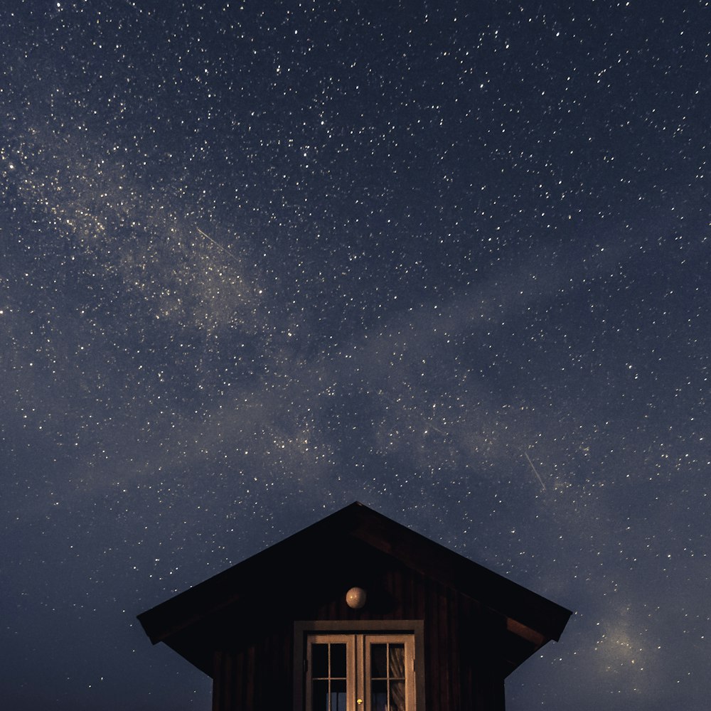 house with window during nighttime