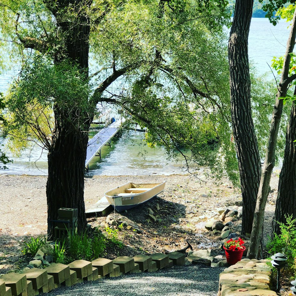 white wooden boat