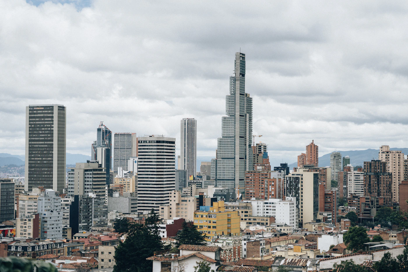 Aerial view of Bogotá historic centre with colonial rooftops and Andean mountains in the distance