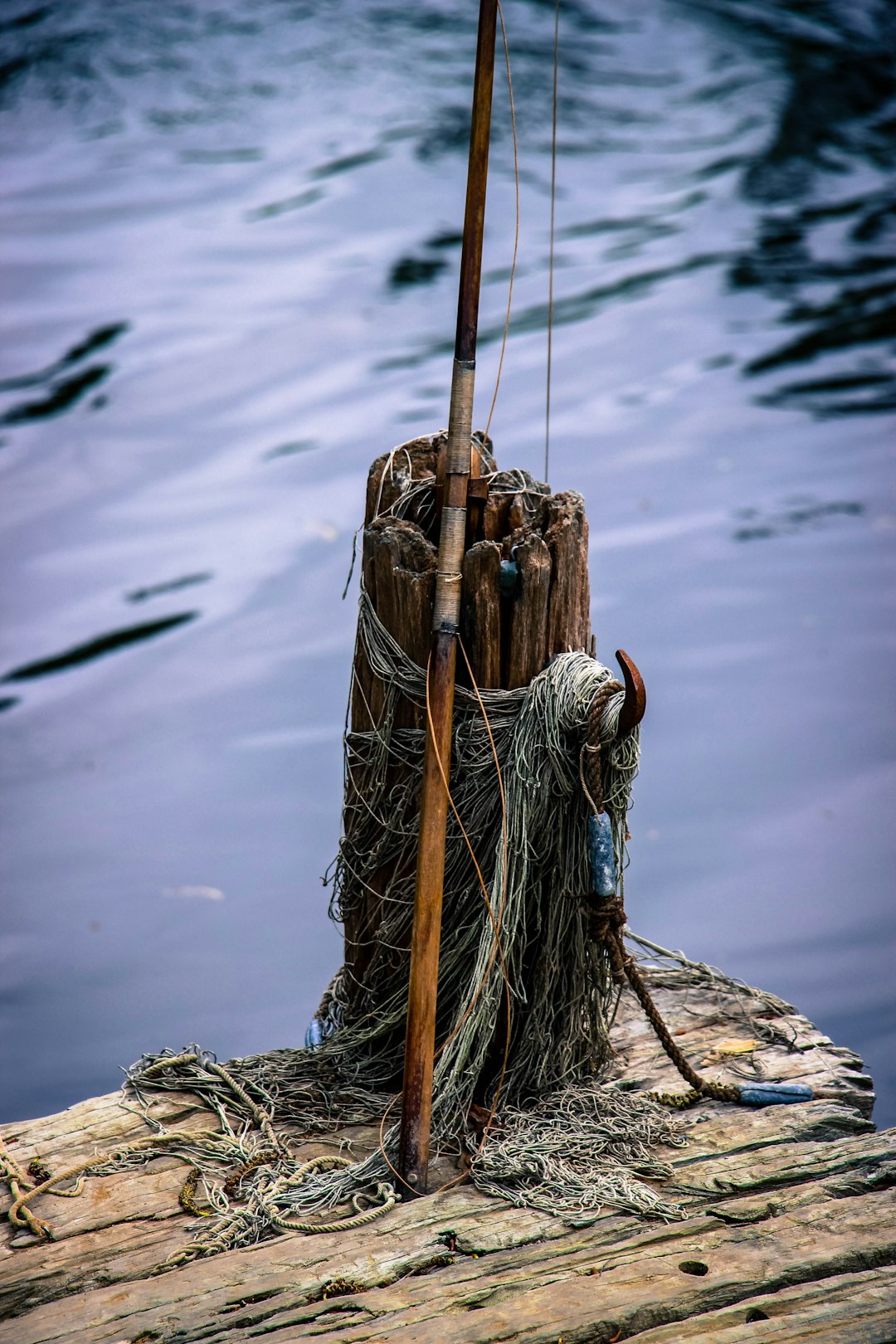wooden fishing rod on dock