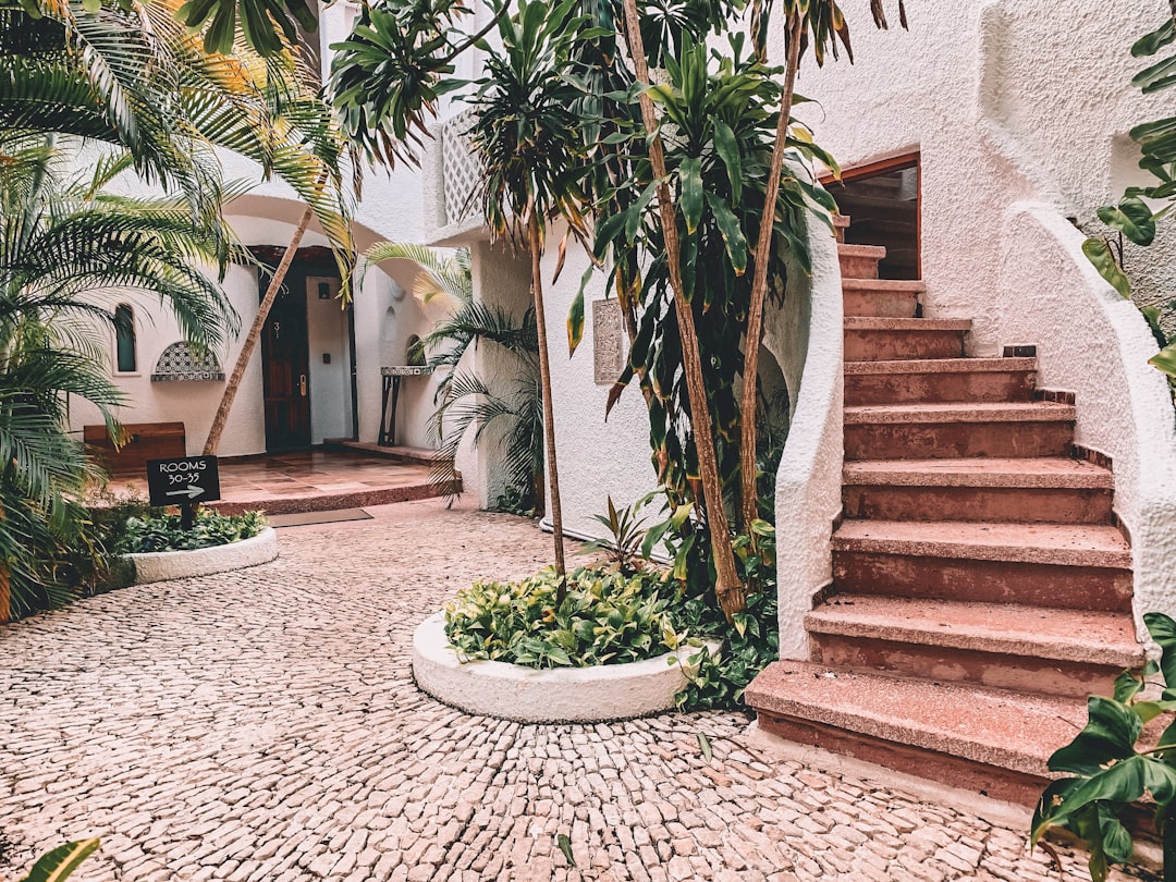 brown concrete stairs on house, Mayan architecture resort Riviera Maya