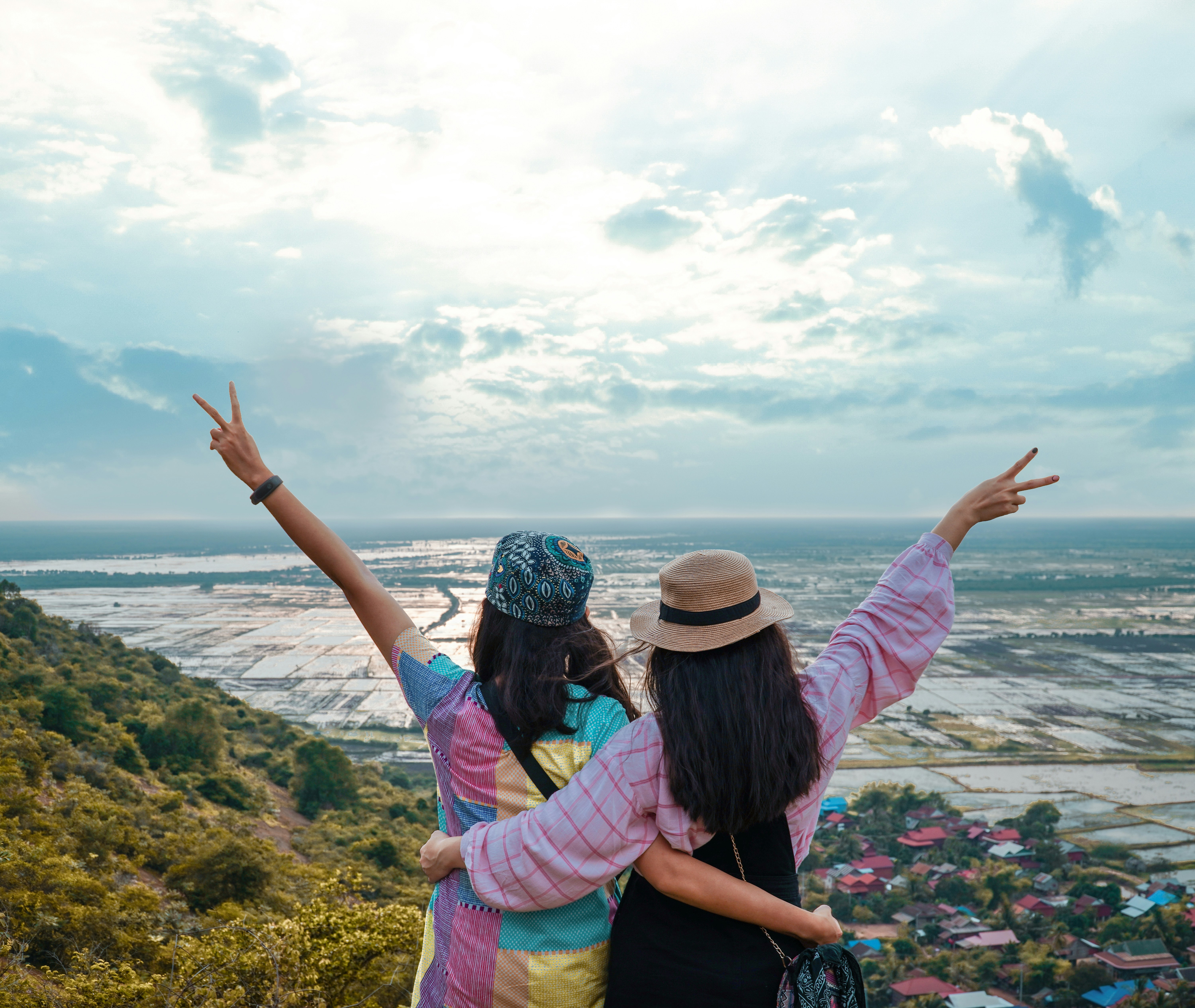 two woman standing during daytime, 