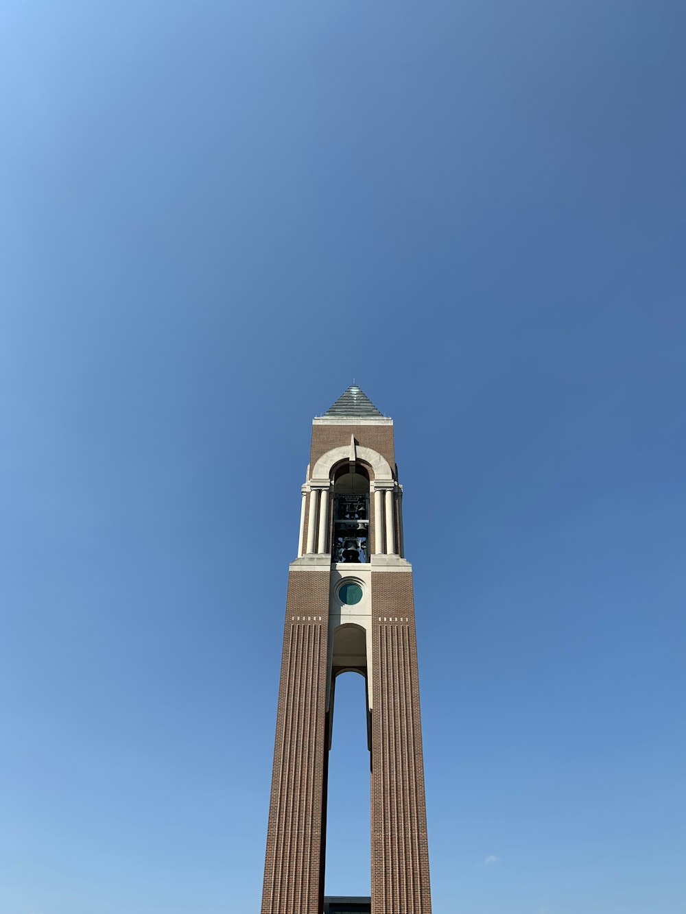 white and brown bell tower