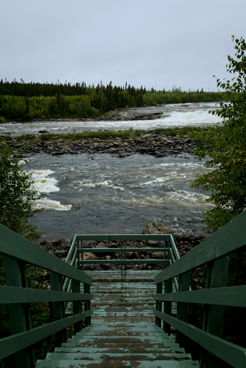 green wooden stairs at daytime