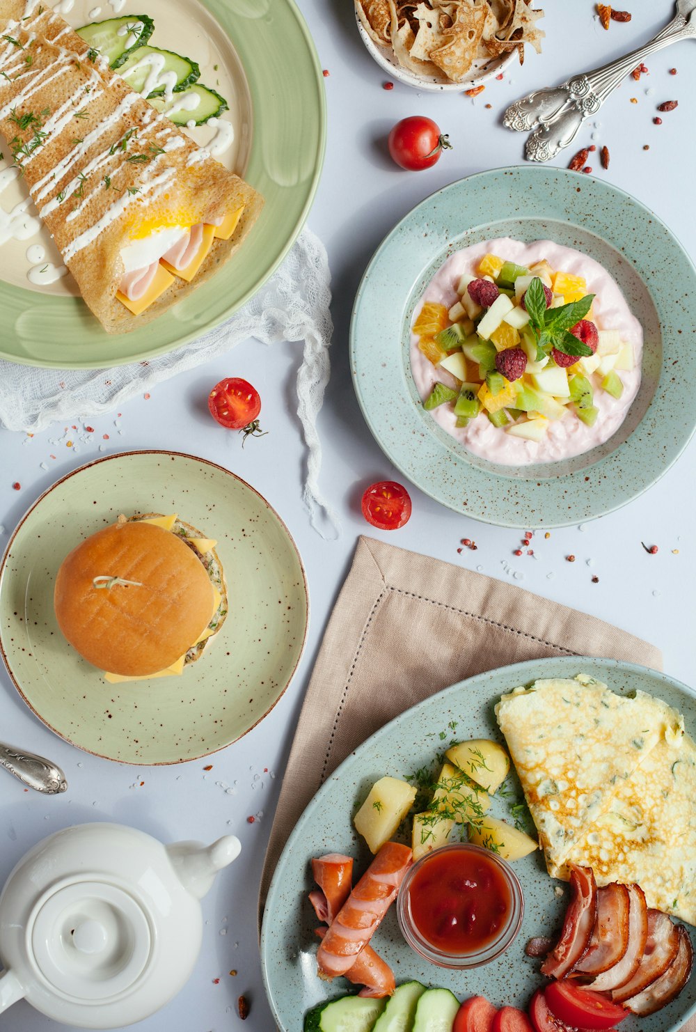 burger and egg on plates