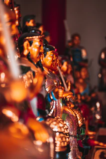 A vibrant arrangement of niche, limited-edition figures lit gently to highlight their craftsmanship.