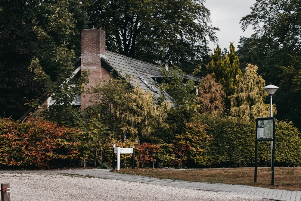 brown house near plants