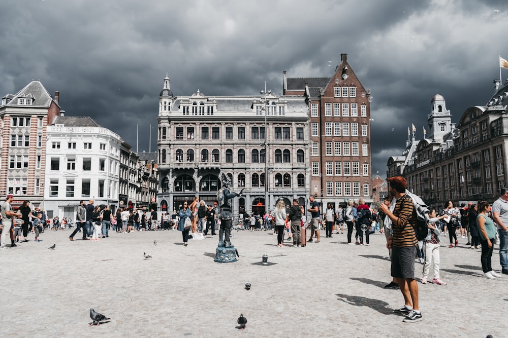 people near buildings