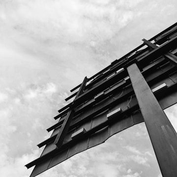 Close-up of a large billboard with intricate lighting and metal framework.