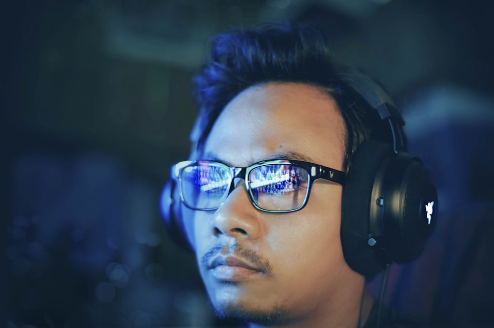 man wearing black headphones
