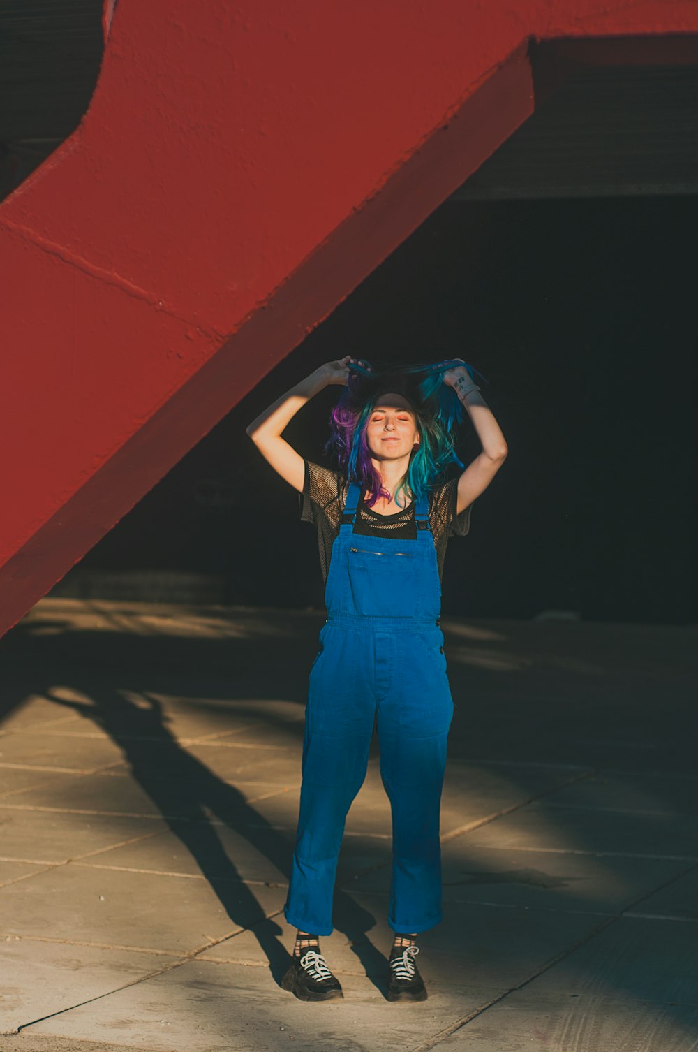 woman in blue rompers