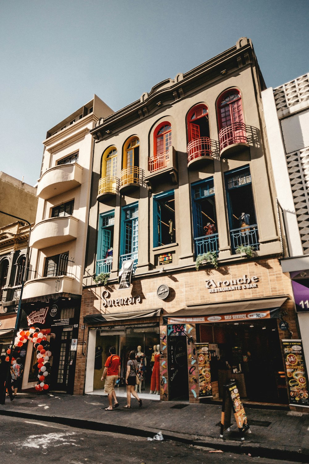 people walking beside store