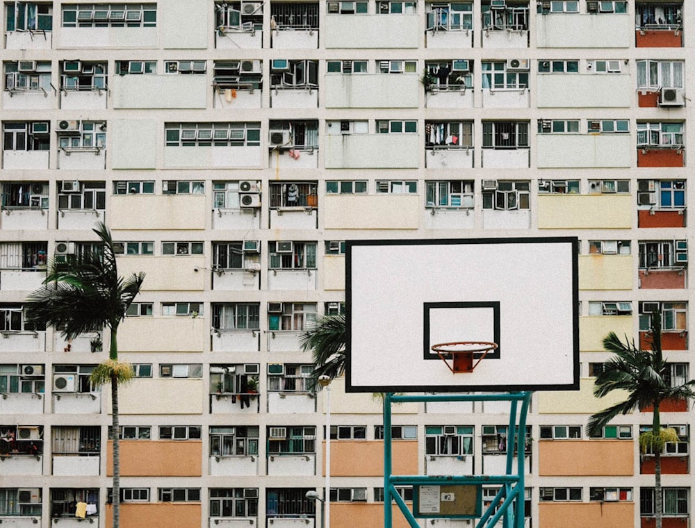photo of white and black basketball hoops