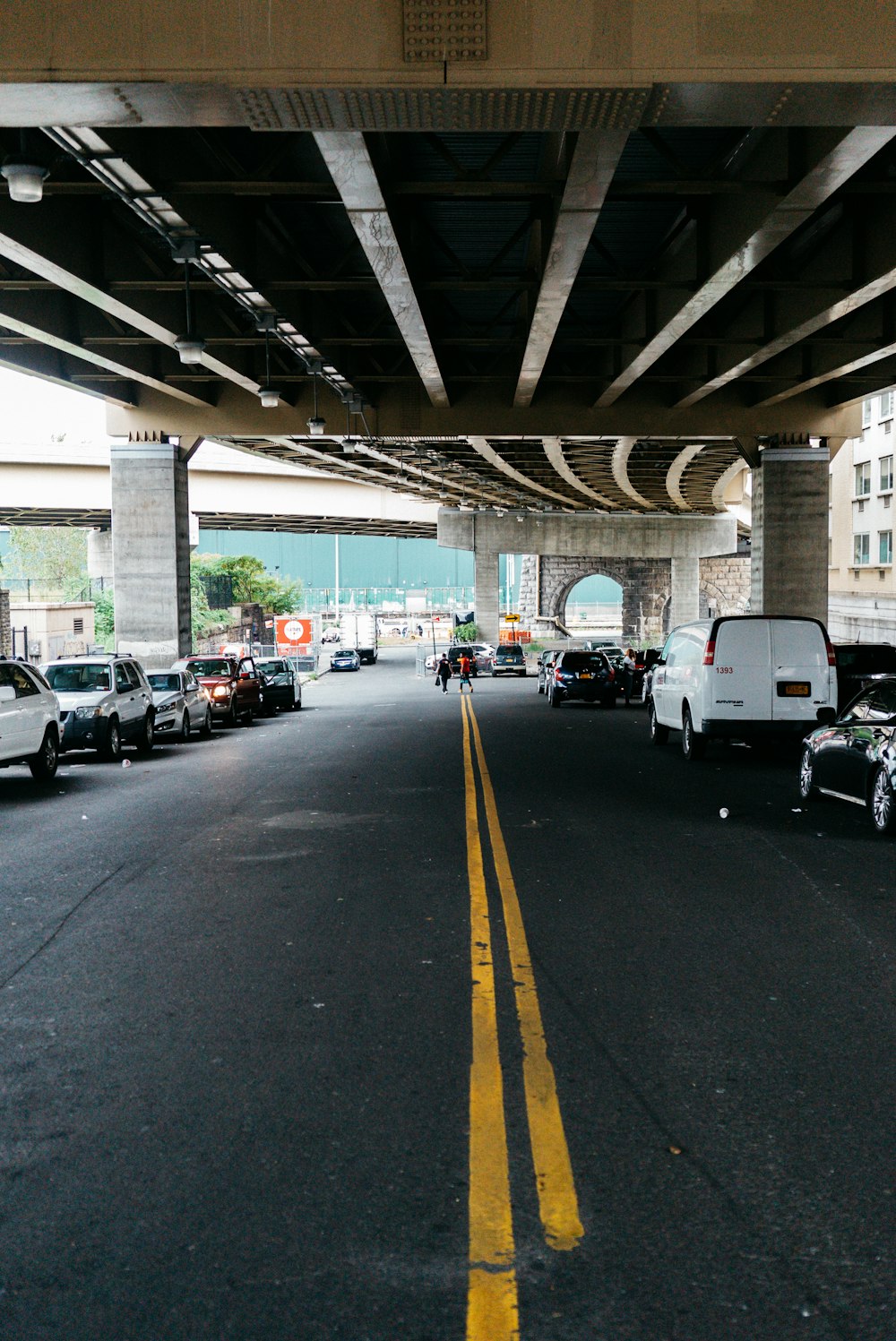 cars parked near overpass