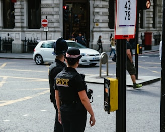 woman wearing black police suit