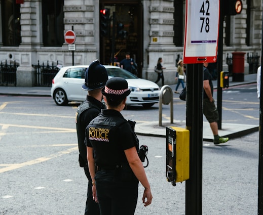 woman wearing black police suit