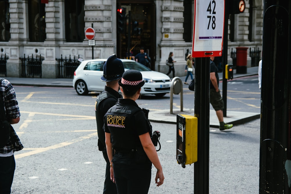 woman wearing black police suit
