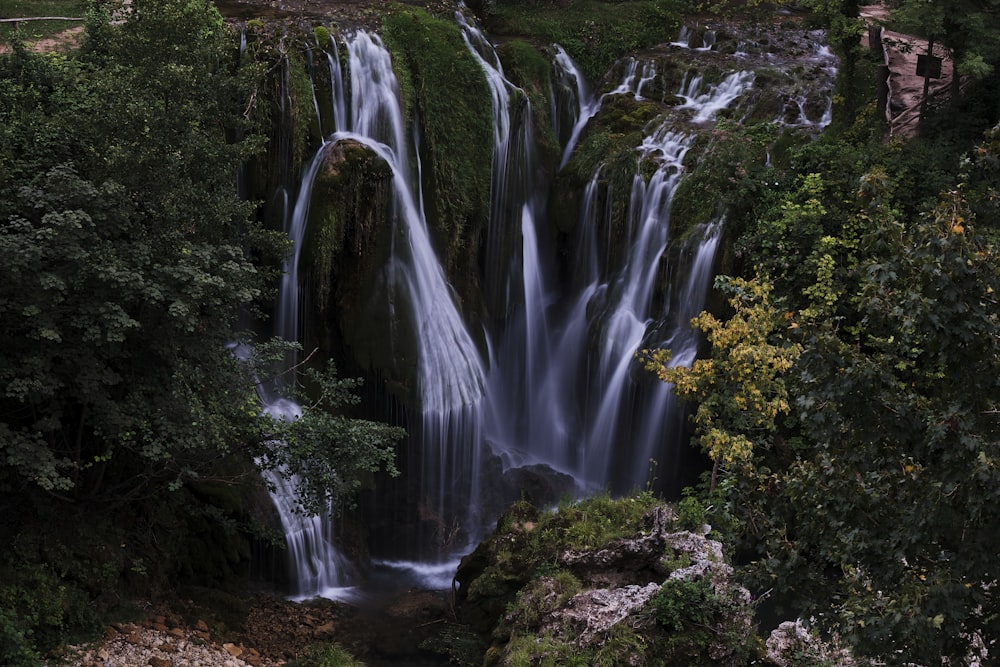 time lapse photography of waterfalls